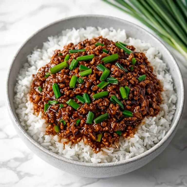 Mongolian Ground Beef Recipe for Easy Weeknight Flavor 3 Mongolian ground beef recipe plated on a wooden table
